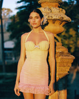 joyce pleated hem mini dress in Gradient yellow