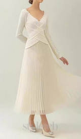 V NECK PLEATED MAXI DRESS IN IVORY