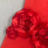 red strapless maxi dress with flower embellishments