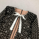 pearl embellished cut out bow mini dress in black