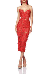 Red strapless dress with intricate detailing on a white background