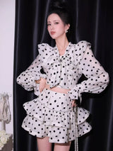 Black-white polka dot ruffled long-sleeved top with puffy skirt