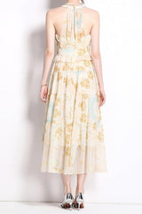 elvira print sleeveless halterneck midi dress in yellow