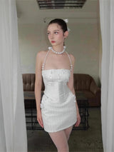 pearl fishbone wrap top skirt set in white