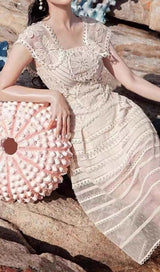 EMBROIDERY TIERED MIDI DRESS IN IVORY WHITE DRESS sis label