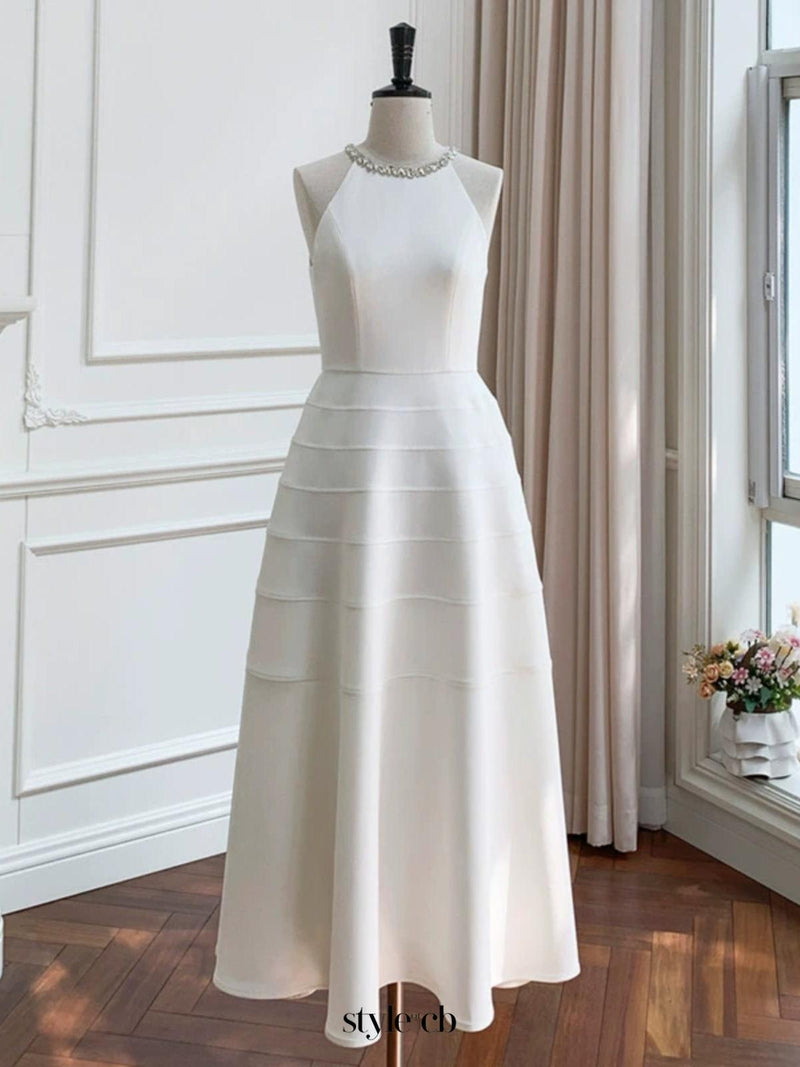 Sleeveless halter neck with diamond midi dress in white