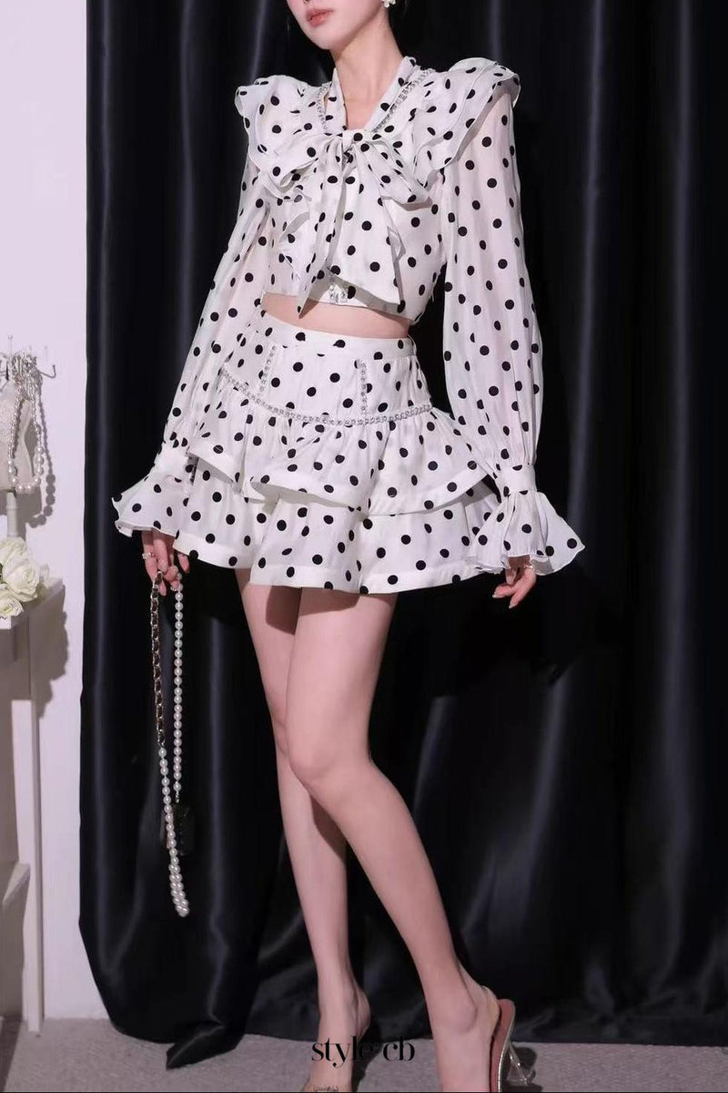 Black-white polka dot ruffled long-sleeved top with puffy skirt