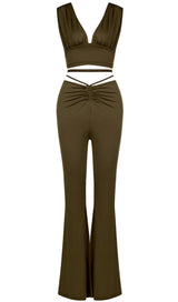 Open-back top and high-waisted bootcut trousers. ohmogo 